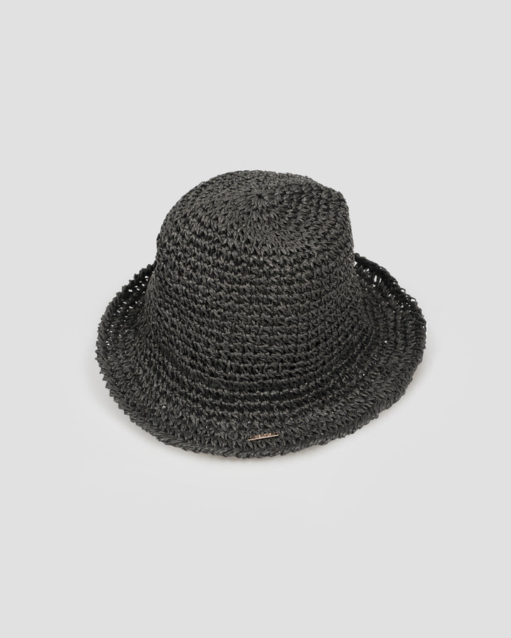 Black woven hat on a white background
